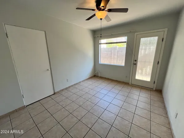 a view of an empty room and window