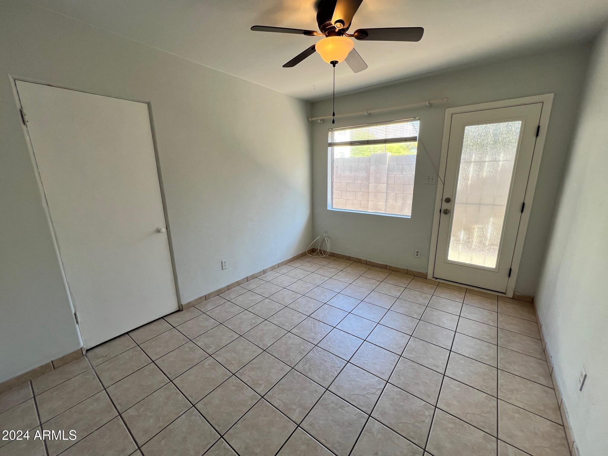 30 West Culver Street, Unit B Phoenix, AZ 85003 - Photo 18 of 36 a view of an empty room and window