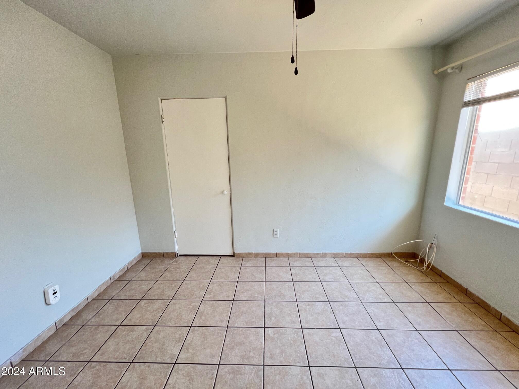 30 West Culver Street, Unit B Phoenix, AZ 85003 - Photo 19 of 36 a view of an empty room and window