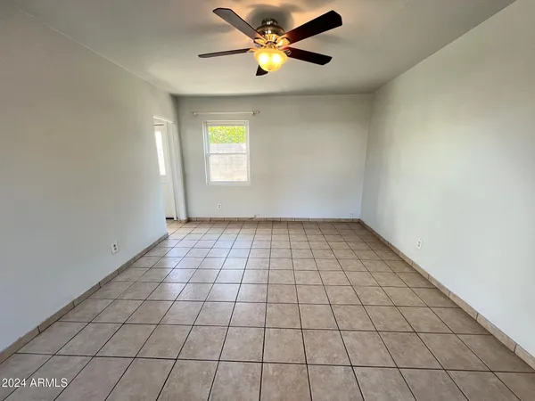 a view of an empty room and window