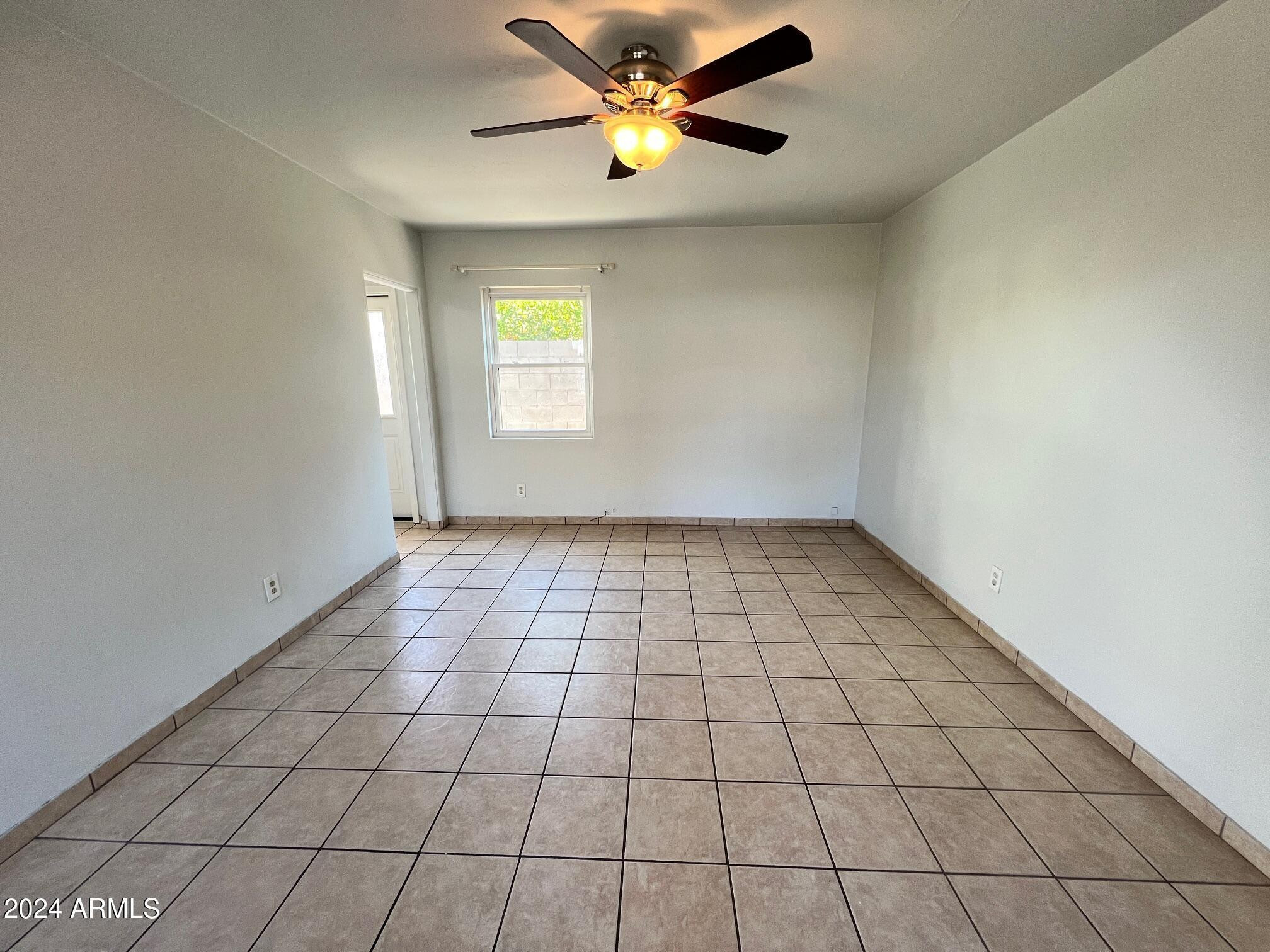 30 West Culver Street, Unit B Phoenix, AZ 85003 - Photo 6 of 36 a view of an empty room and window