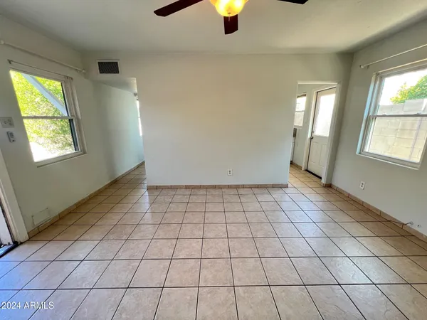a view of an empty room and window