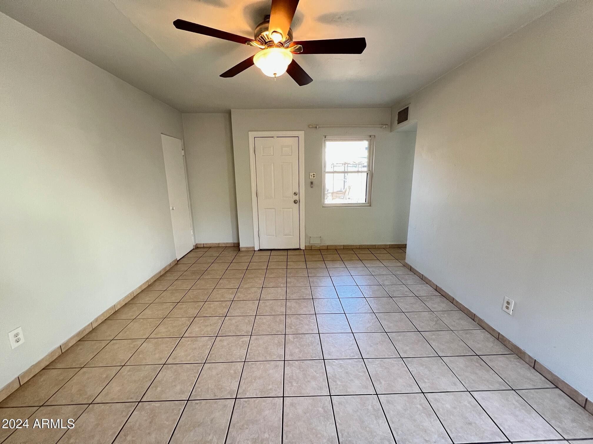 30 West Culver Street, Unit B Phoenix, AZ 85003 - Photo 10 of 36 a view of an empty room and window