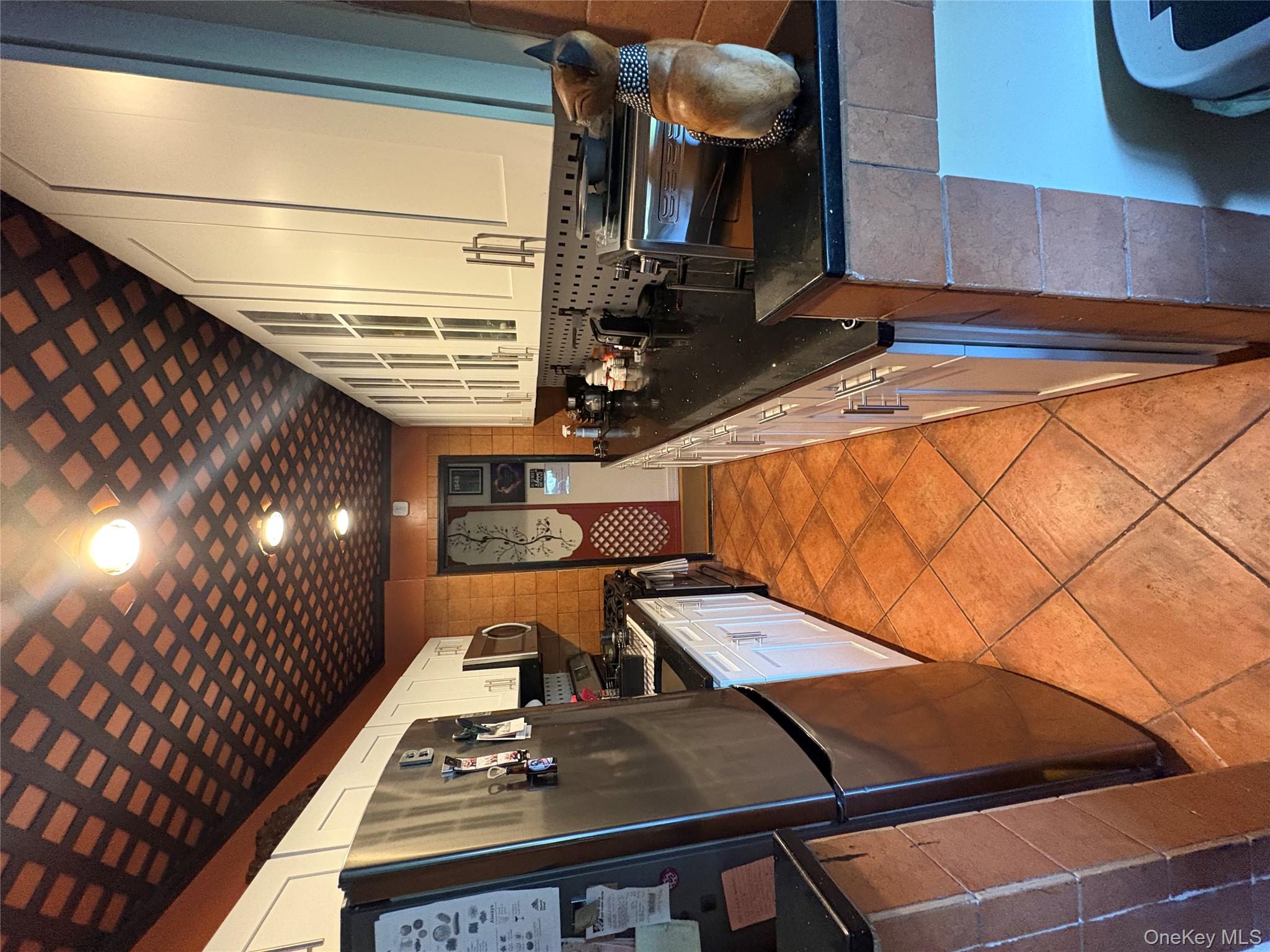 153-25 88th Street, Unit 5L Queens, NY 11414 - Photo 3 of 7 a very nice looking room with many windows