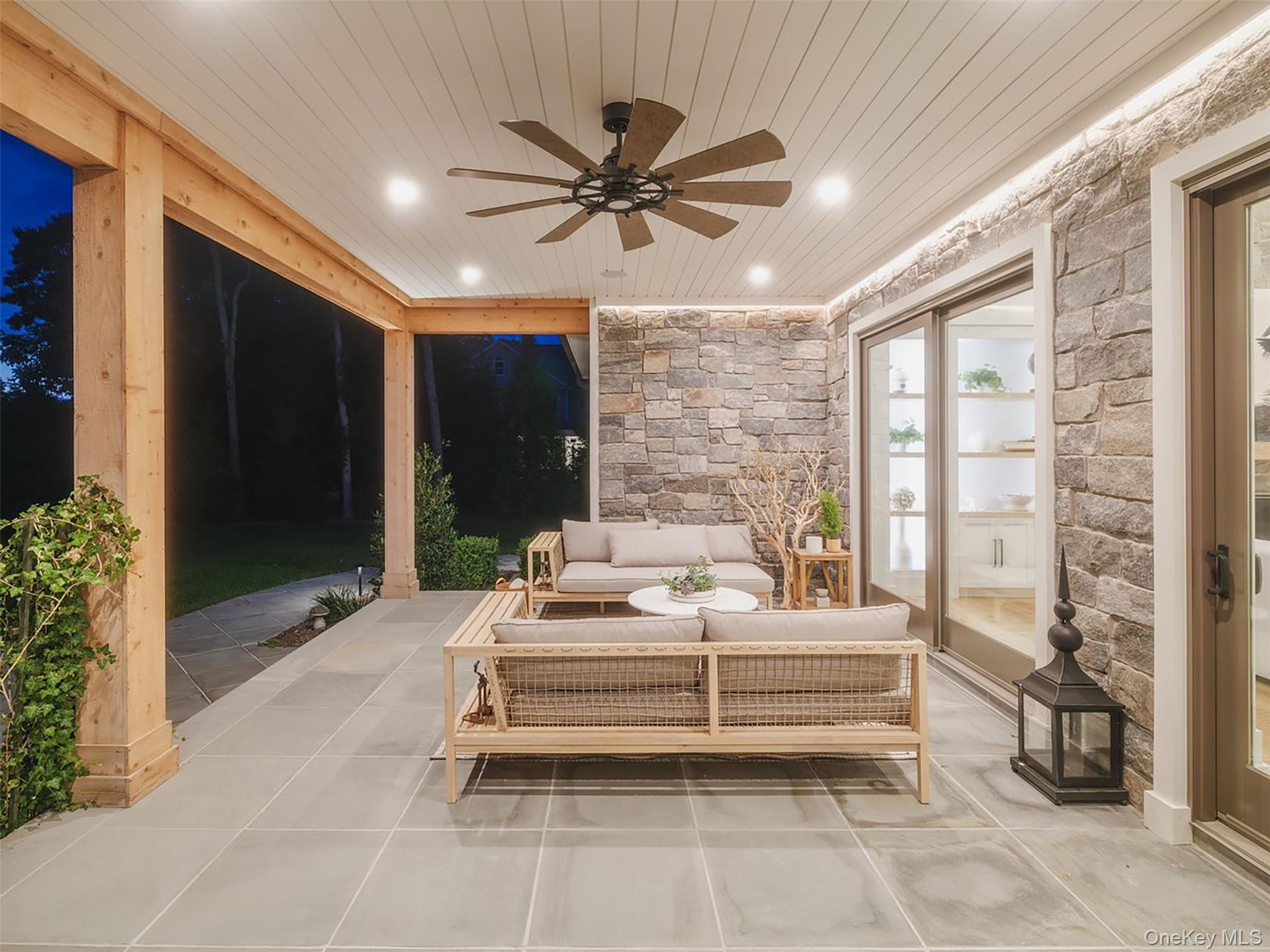 465 Ripple Water Lane Southold, NY 11971 - Photo 15 of 47 View of patio / terrace with ceiling fan and an outdoor hangout area