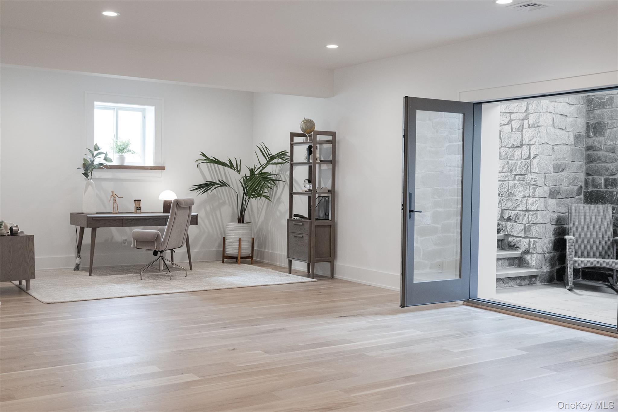 465 Ripple Water Lane Southold, NY 11971 - Photo 42 of 47 Home office featuring light wood-style floors and recessed lighting