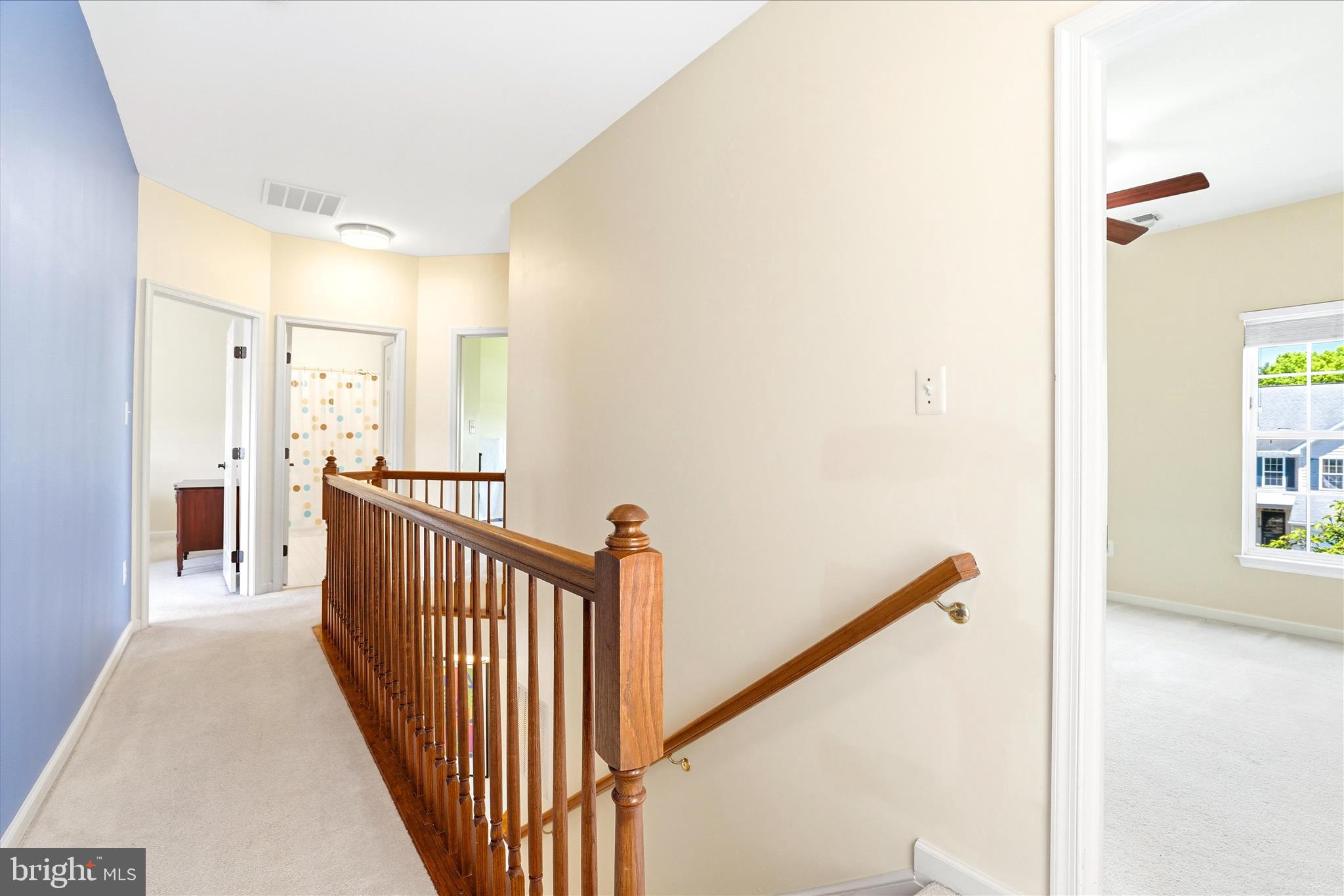 9009 Bealls Farm Road Frederick, MD 21704 - Photo 16 of 41 a view of a hallway with wooden floor and entryway