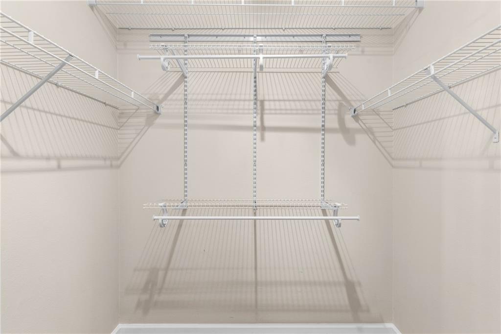 3777 Peachtree Road Northeast, Unit 1529 Atlanta, GA 30319 - Photo 20 of 45 a view of a room with racks on the wall