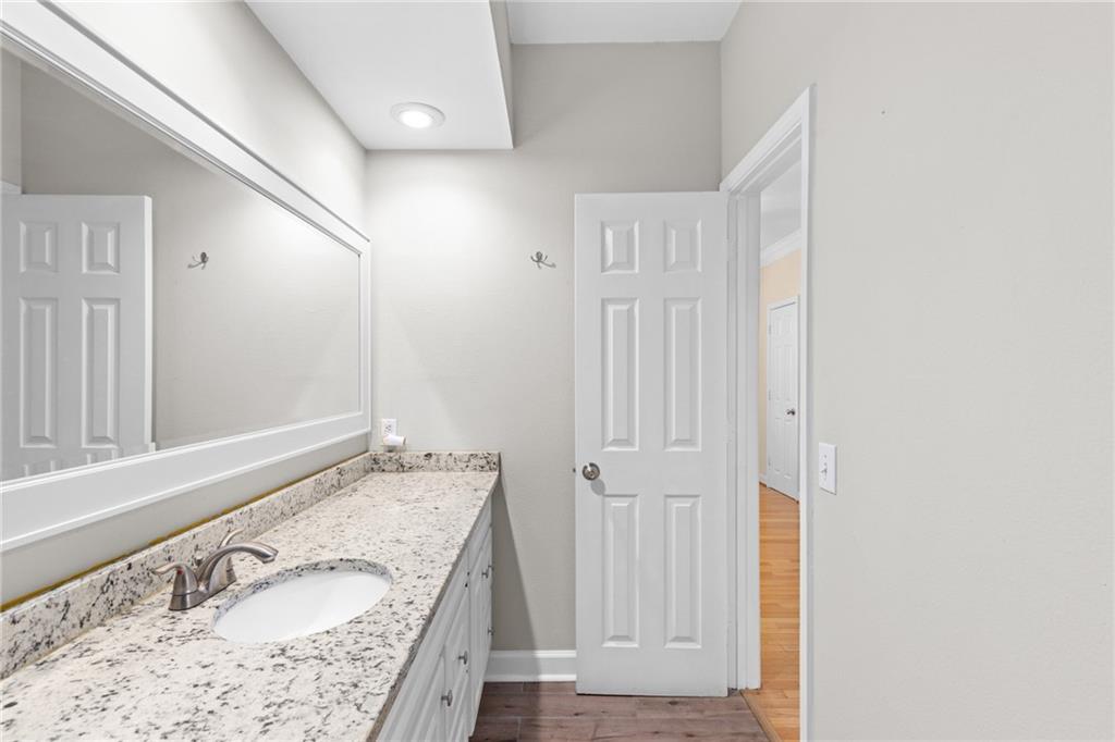 3777 Peachtree Road Northeast, Unit 1529 Atlanta, GA 30319 - Photo 23 of 45 a bathroom with a tub sink and vanity