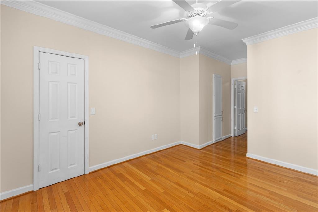3777 Peachtree Road Northeast, Unit 1529 Atlanta, GA 30319 - Photo 26 of 45 a view of empty room with wooden floor