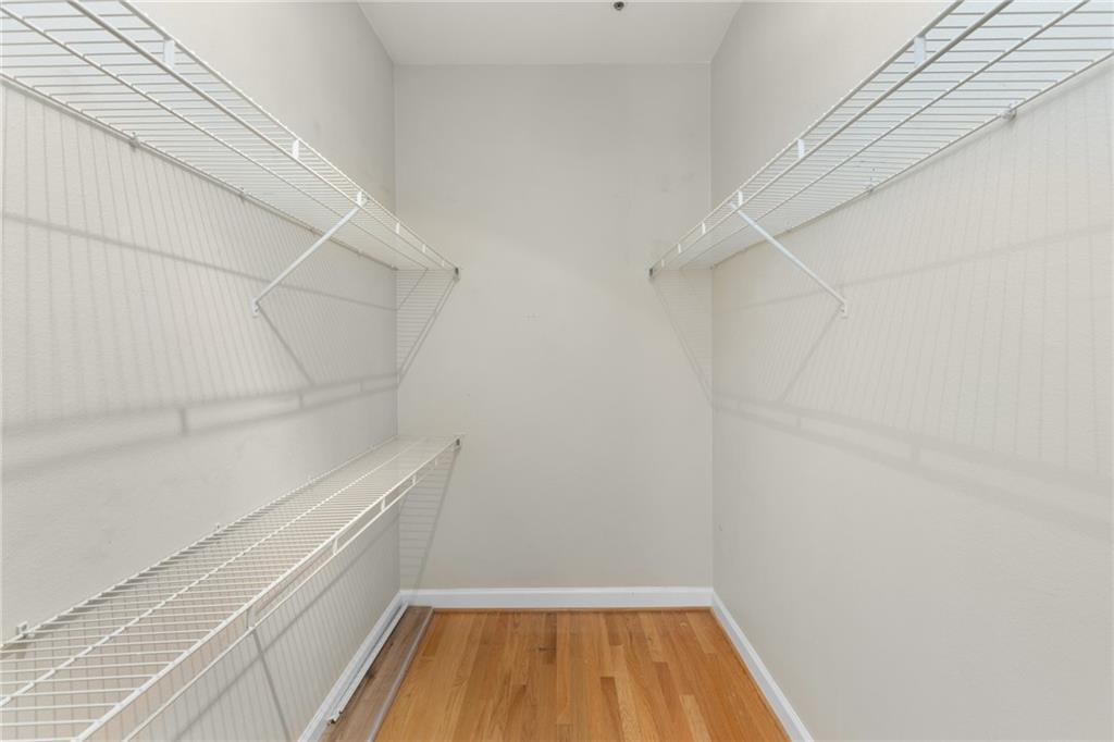 3777 Peachtree Road Northeast, Unit 1529 Atlanta, GA 30319 - Photo 27 of 45 a view of a room with racks on the wall