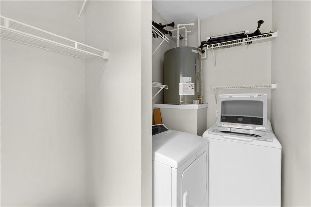 3777 Peachtree Road Northeast, Unit 1529 Atlanta, GA 30319 - Photo 28 of 45 a utility room with dryer and washer