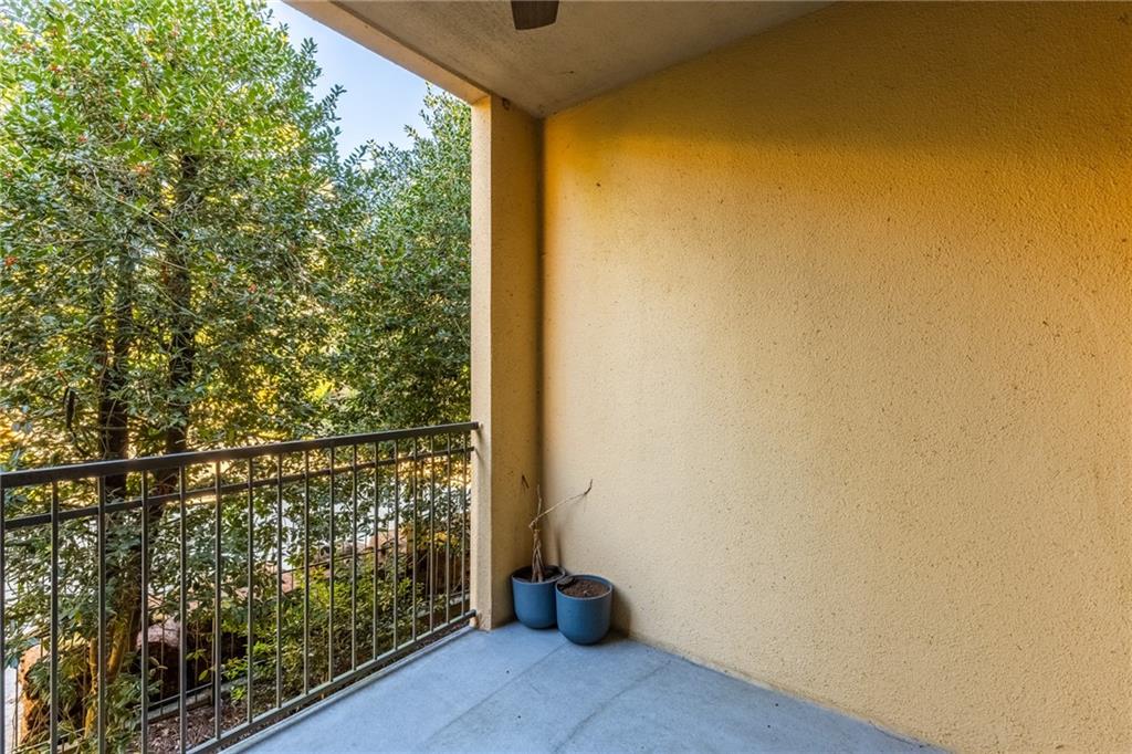 3777 Peachtree Road Northeast, Unit 1529 Atlanta, GA 30319 - Photo 29 of 45 a view of a glass door and porch