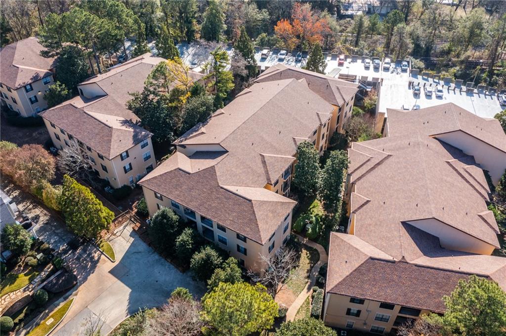 3777 Peachtree Road Northeast, Unit 1529 Atlanta, GA 30319 - Photo 42 of 45 an aerial view of houses with yard
