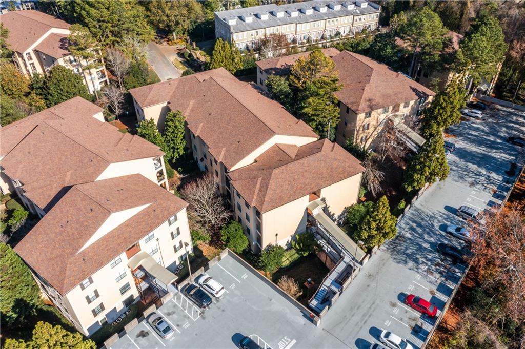 3777 Peachtree Road Northeast, Unit 1529 Atlanta, GA 30319 - Photo 43 of 45 an aerial view of a house with a yard