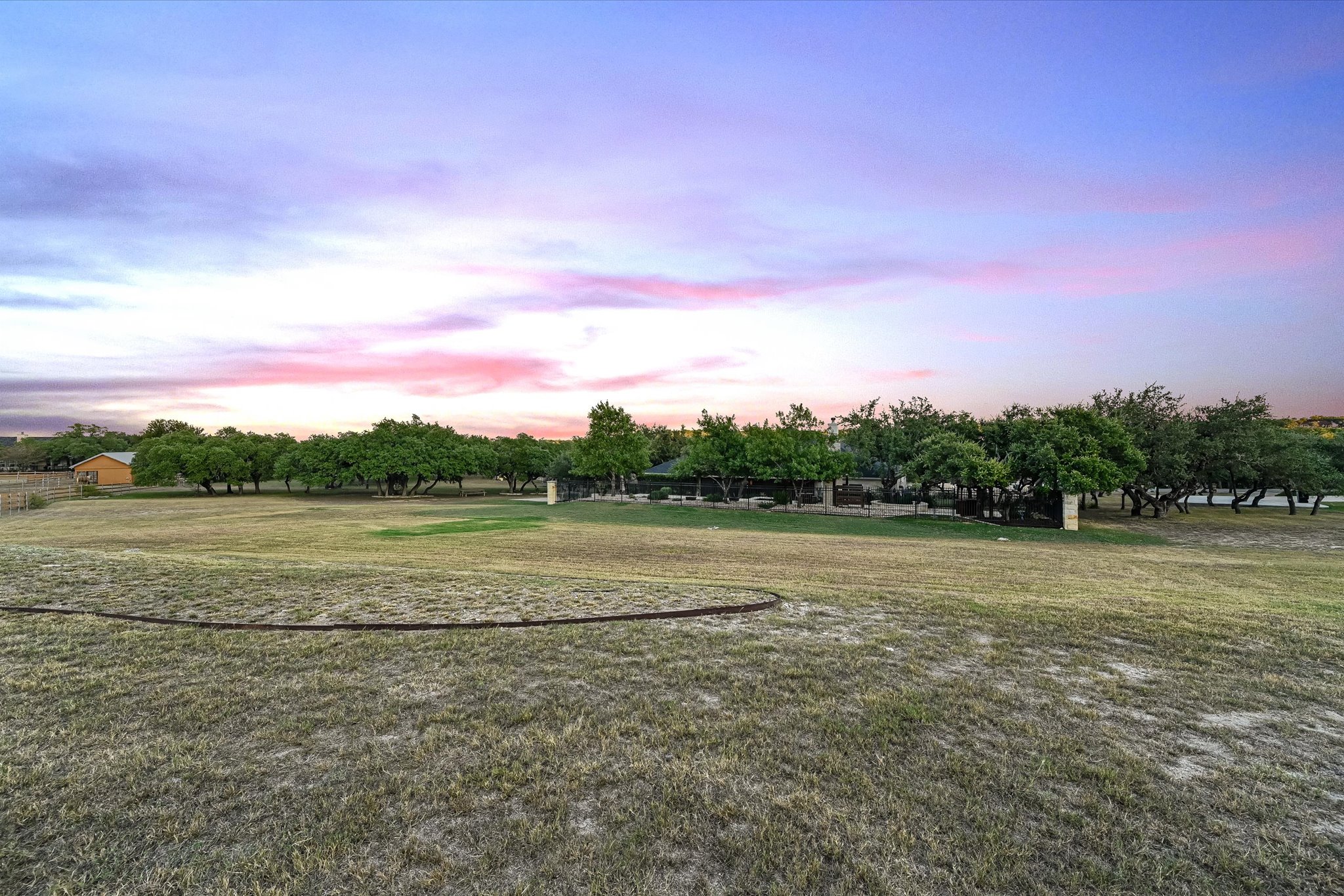 786 Ranchers Club Lane Driftwood, TX 78619 - Photo 31 of 33 View of green lawn featuring a view of rural / pastoral area