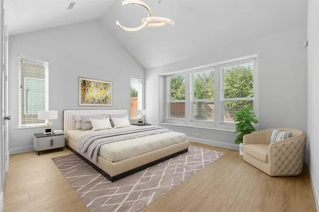 a bedroom with a bed and a couch