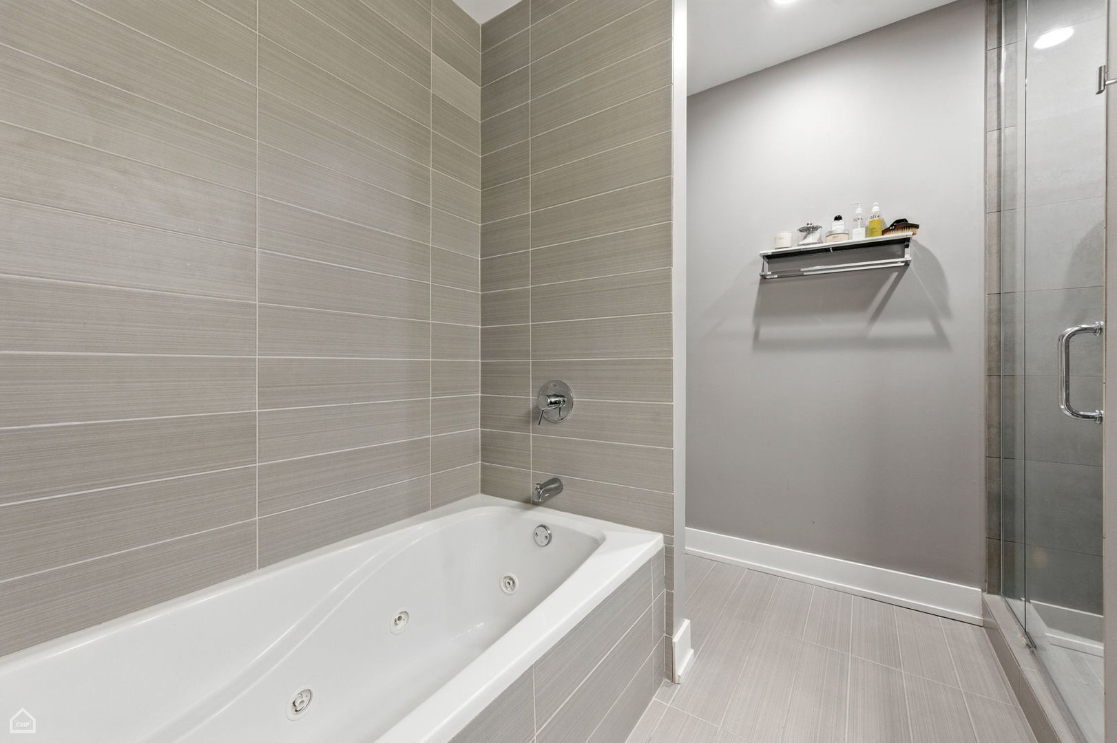 1312 West Madison Street, Unit 3A Chicago, IL 60607 - Photo 15 of 21 a bathroom with a tub and sink