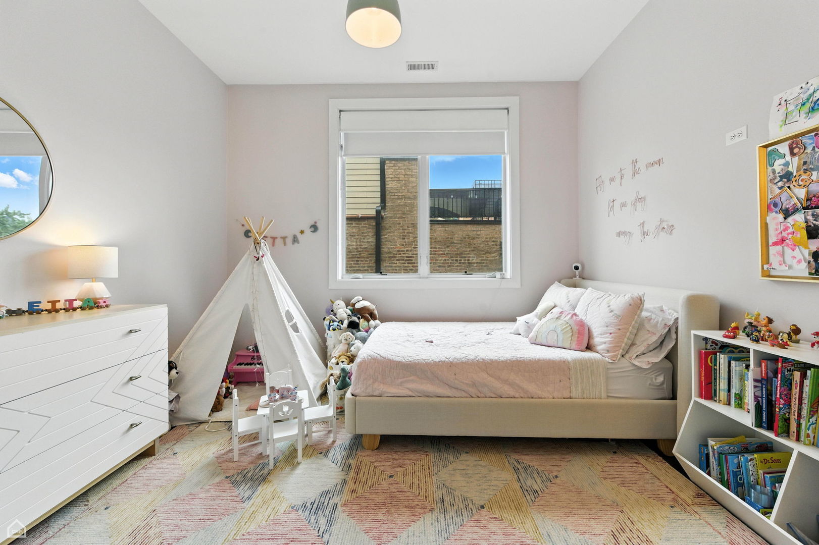 1312 West Madison Street, Unit 3A Chicago, IL 60607 - Photo 16 of 21 a bedroom with a bed and a window
