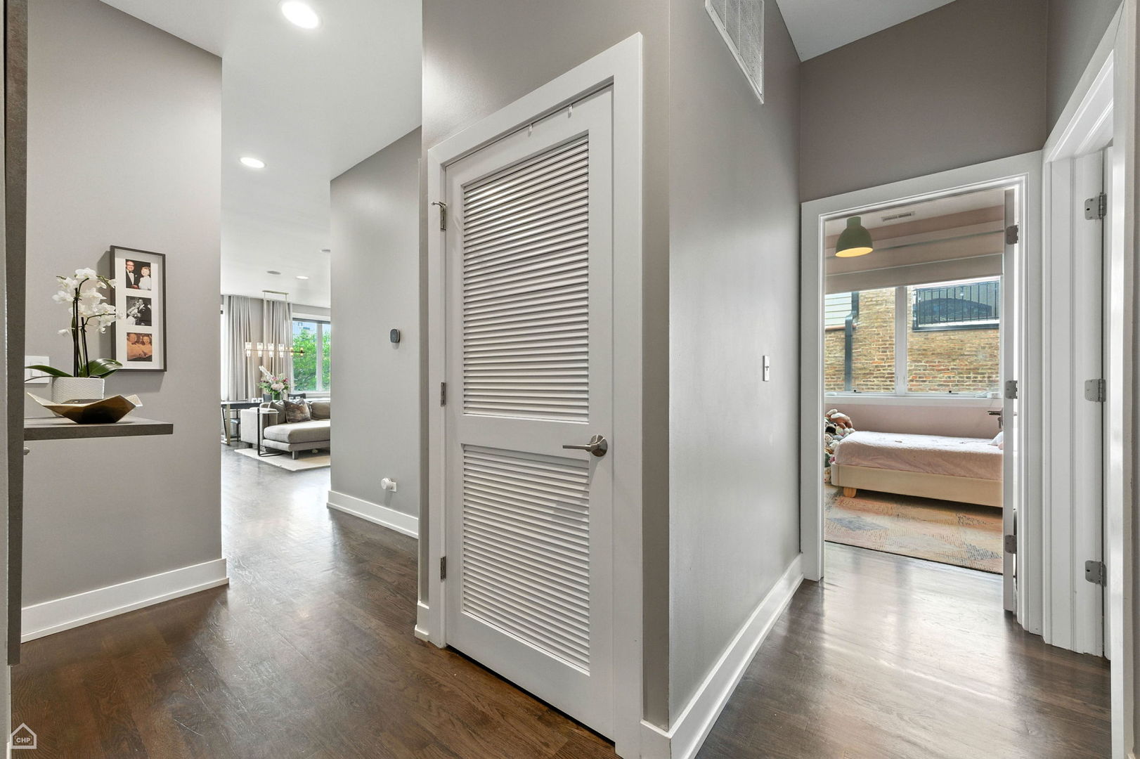 1312 West Madison Street, Unit 3A Chicago, IL 60607 - Photo 19 of 21 a view of a hallway view with wooden floor and living room