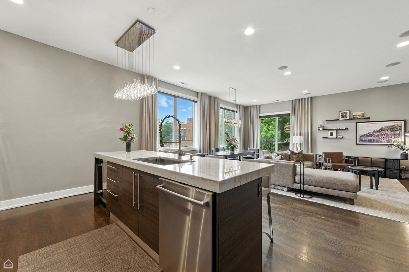 1312 West Madison Street, Unit 3A Chicago, IL 60607 - Photo 8 of 21 a kitchen with sink and couches
