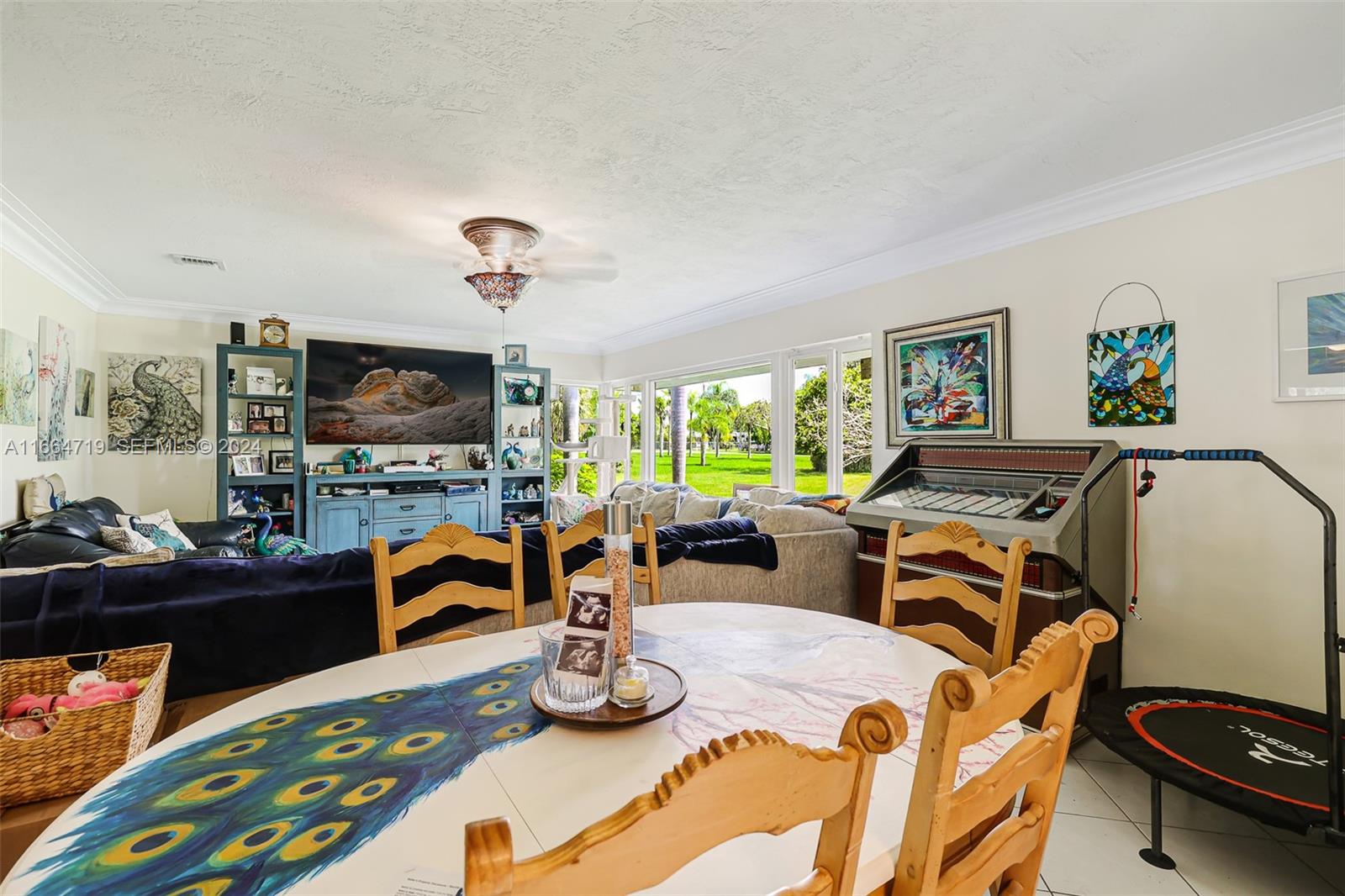 17421 Southwest 300th Street Homestead, FL 33030 - Photo 13 of 62 a living room with furniture and a flat screen tv