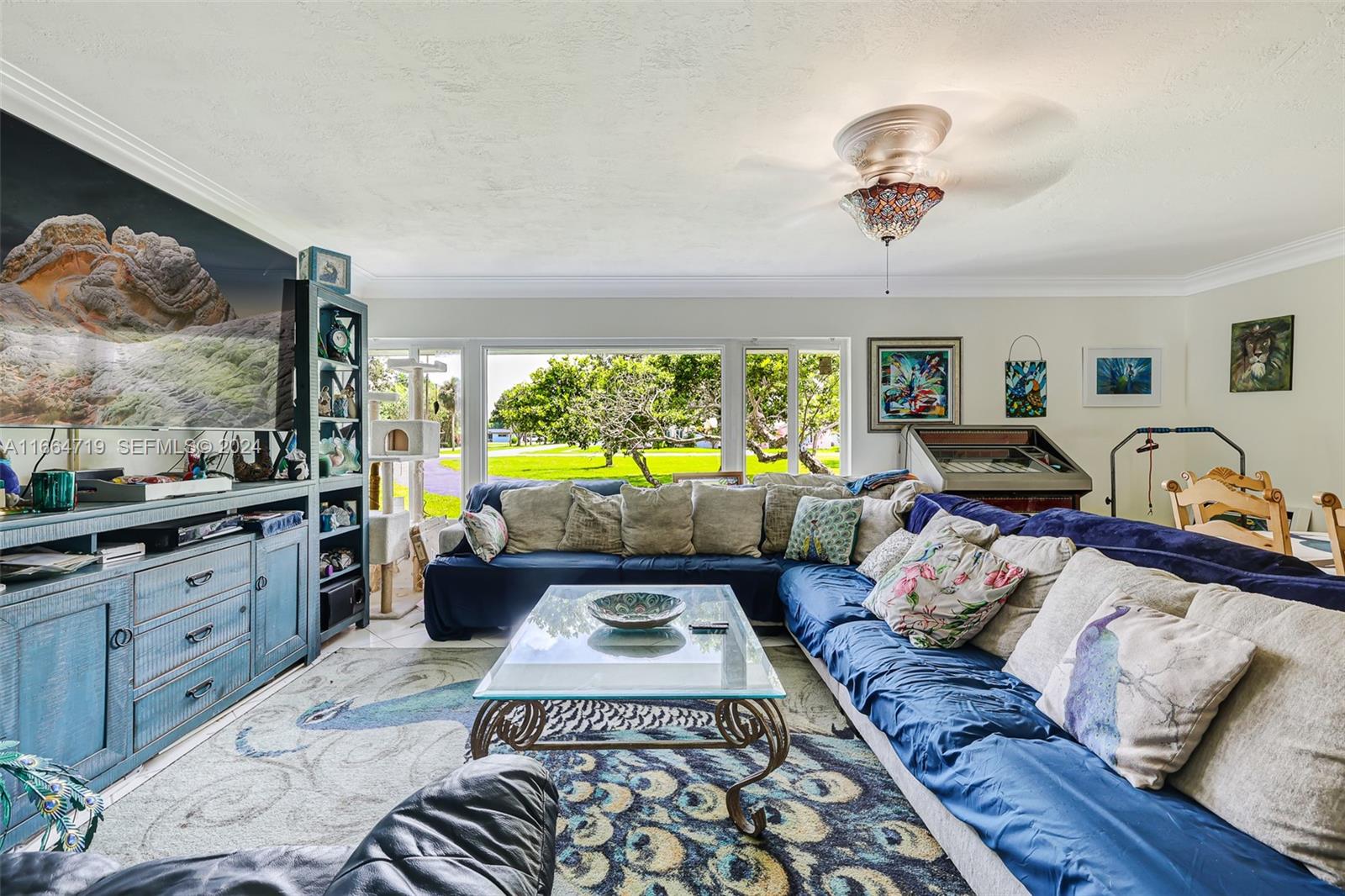 17421 Southwest 300th Street Homestead, FL 33030 - Photo 15 of 62 a bed room with a bed and a couch