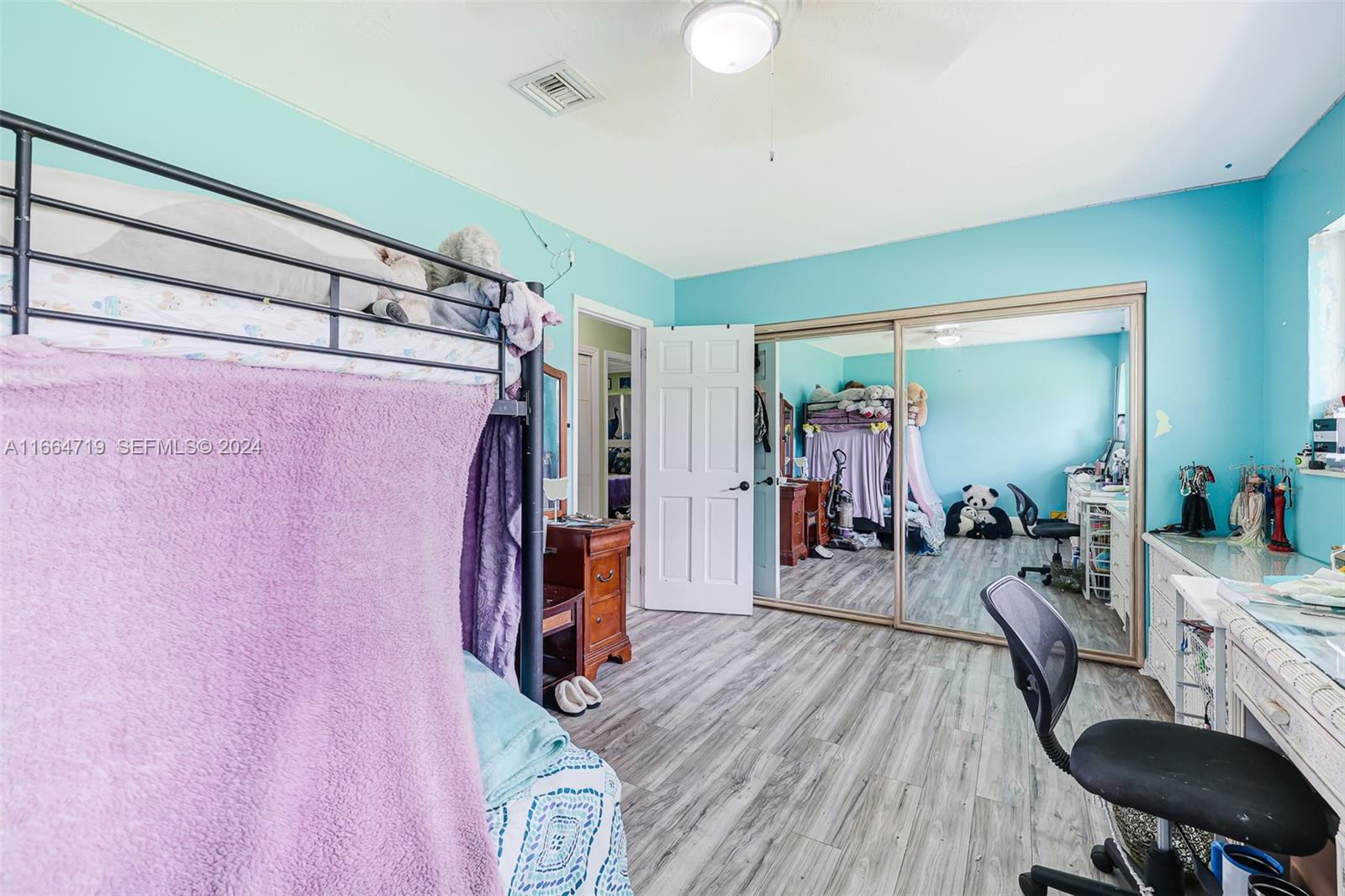 17421 Southwest 300th Street Homestead, FL 33030 - Photo 29 of 62 a view of a room with gym equipment