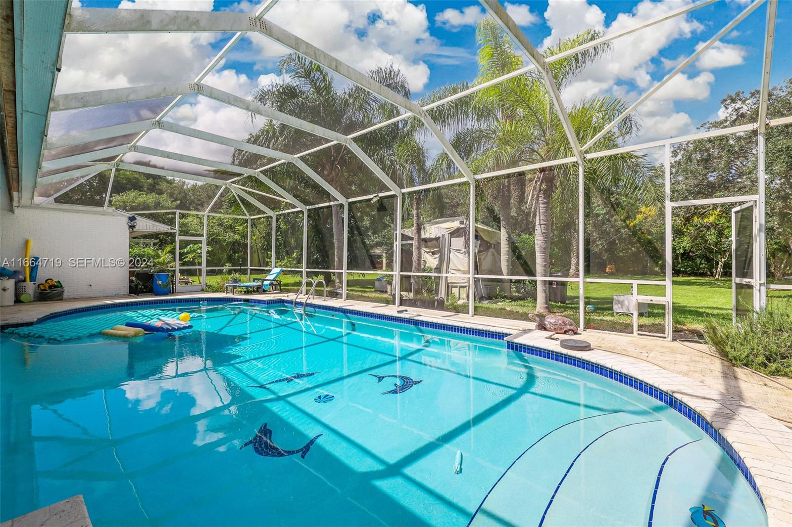 17421 Southwest 300th Street Homestead, FL 33030 - Photo 39 of 62 a view of a house with a backyard