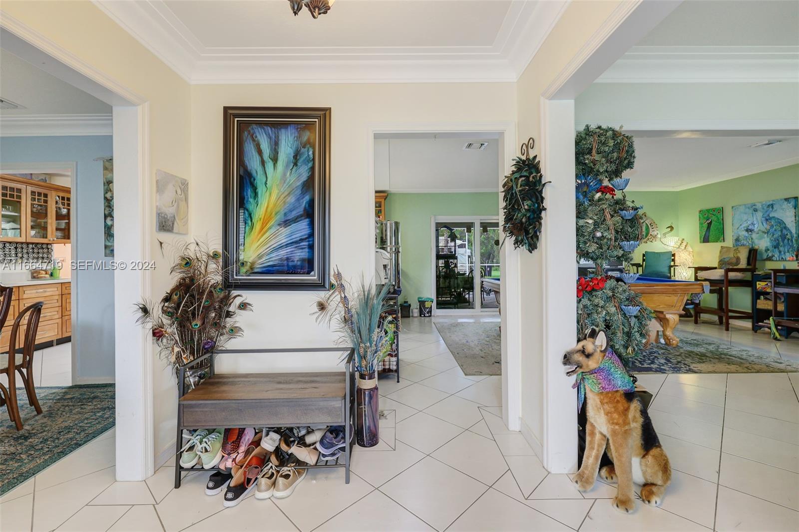 17421 Southwest 300th Street Homestead, FL 33030 - Photo 48 of 62 a view of living room filled with furniture and a potted plant