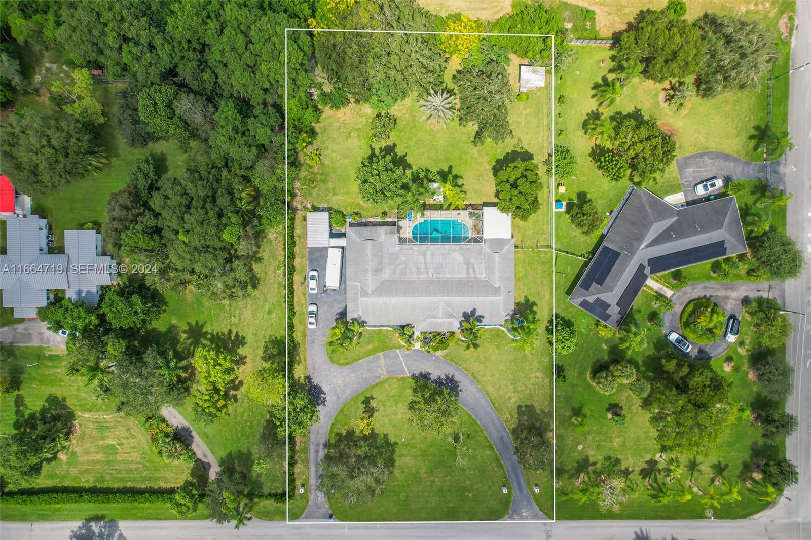 17421 Southwest 300th Street Homestead, FL 33030 - Photo 58 of 62 an aerial view of a residential houses with yard