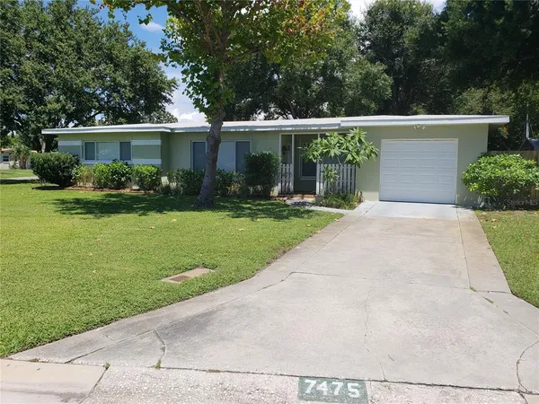 front view of a house and a yard