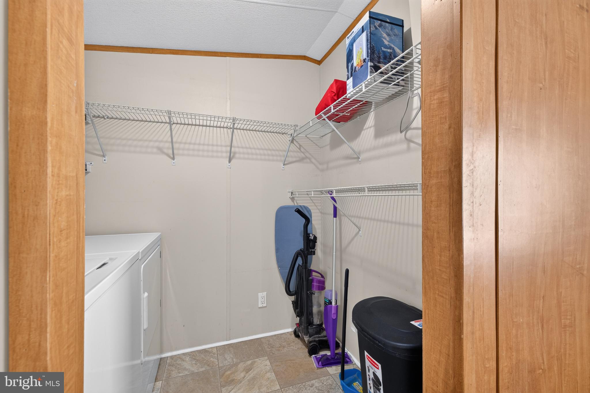 8 West Reybold Drive, Unit 8 Middletown, DE 19709 - Photo 22 of 30 Efficient laundry space with storage.