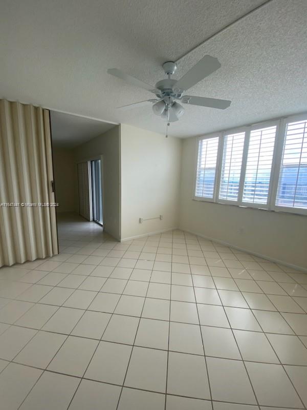 3850 Washington Street, Unit 1110 Hollywood, FL 33021 - Photo 25 of 29 an empty room with windows