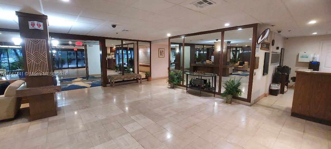3850 Washington Street, Unit 1110 Hollywood, FL 33021 - Photo 27 of 29 a view of a room with gym equipment
