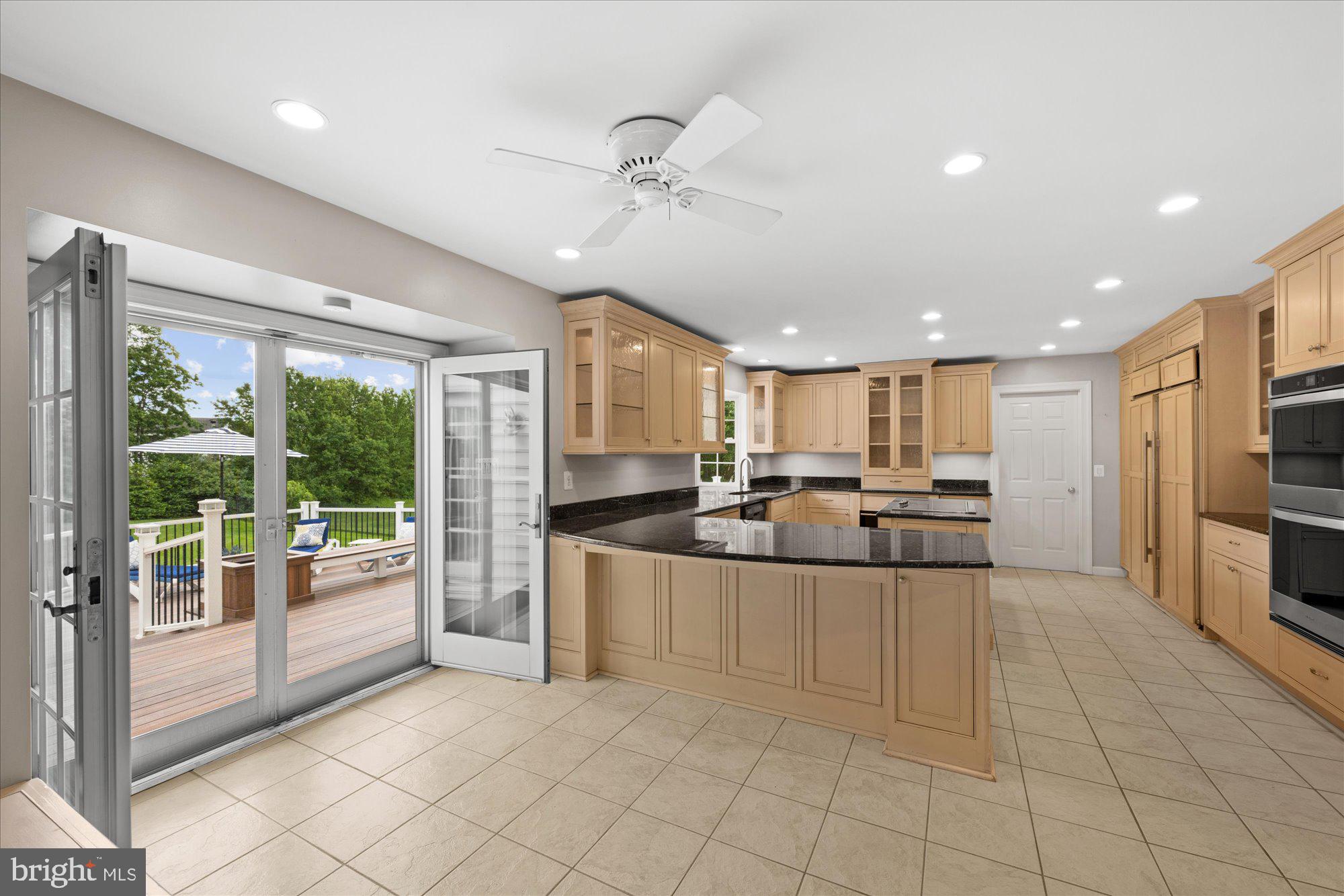 17017 Spates Hill Road Poolesville, MD 20837 - Photo 14 of 59 Gourmet kitchen is adjacent to the family room