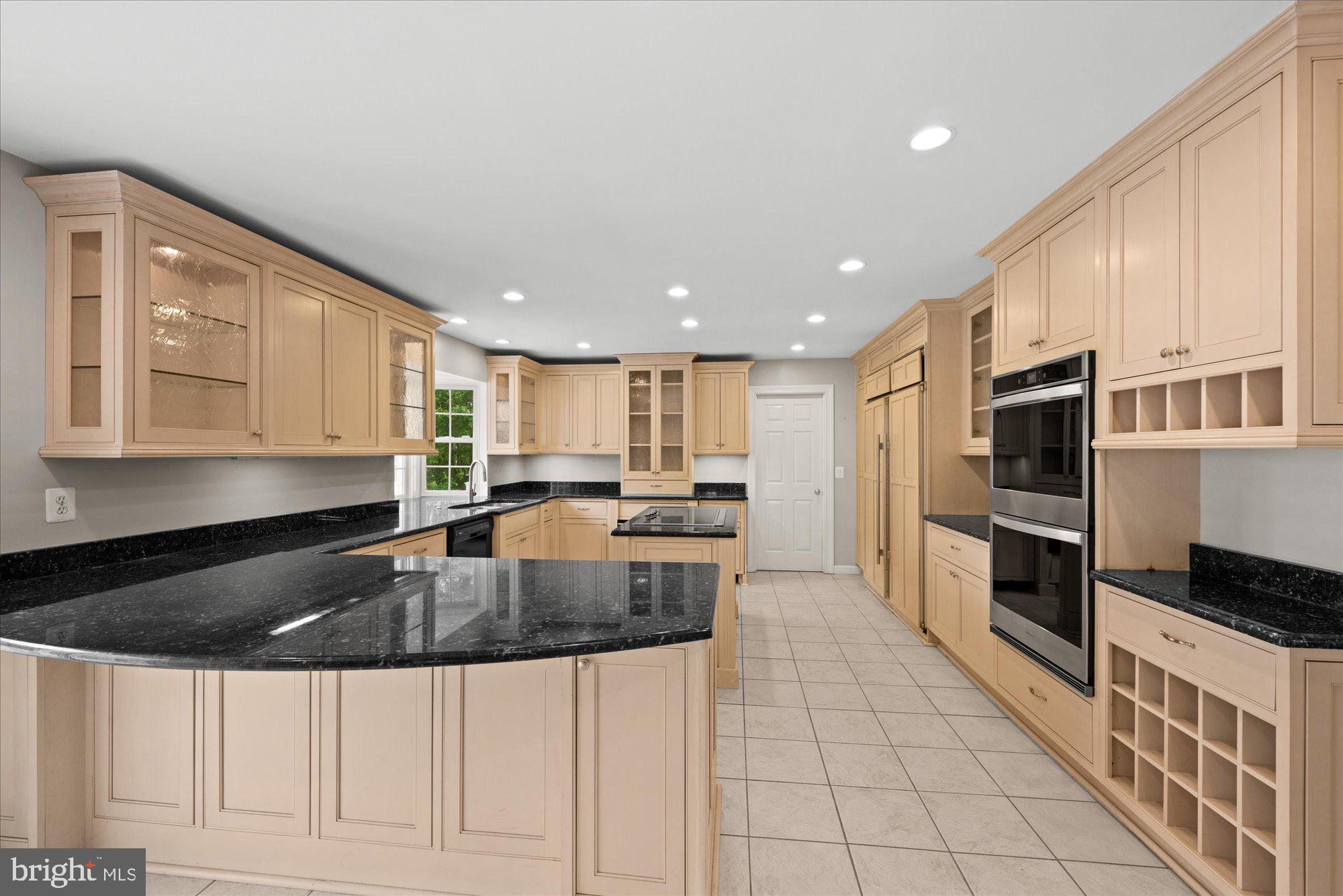 17017 Spates Hill Road Poolesville, MD 20837 - Photo 16 of 59 Renovated kitchen with custom cabinetry