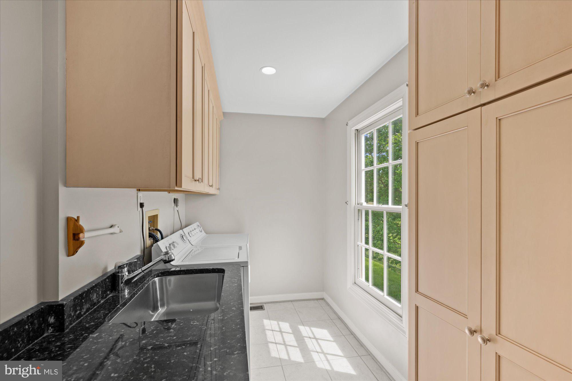 17017 Spates Hill Road Poolesville, MD 20837 - Photo 22 of 59 Laundry/mud room off the garage entrance