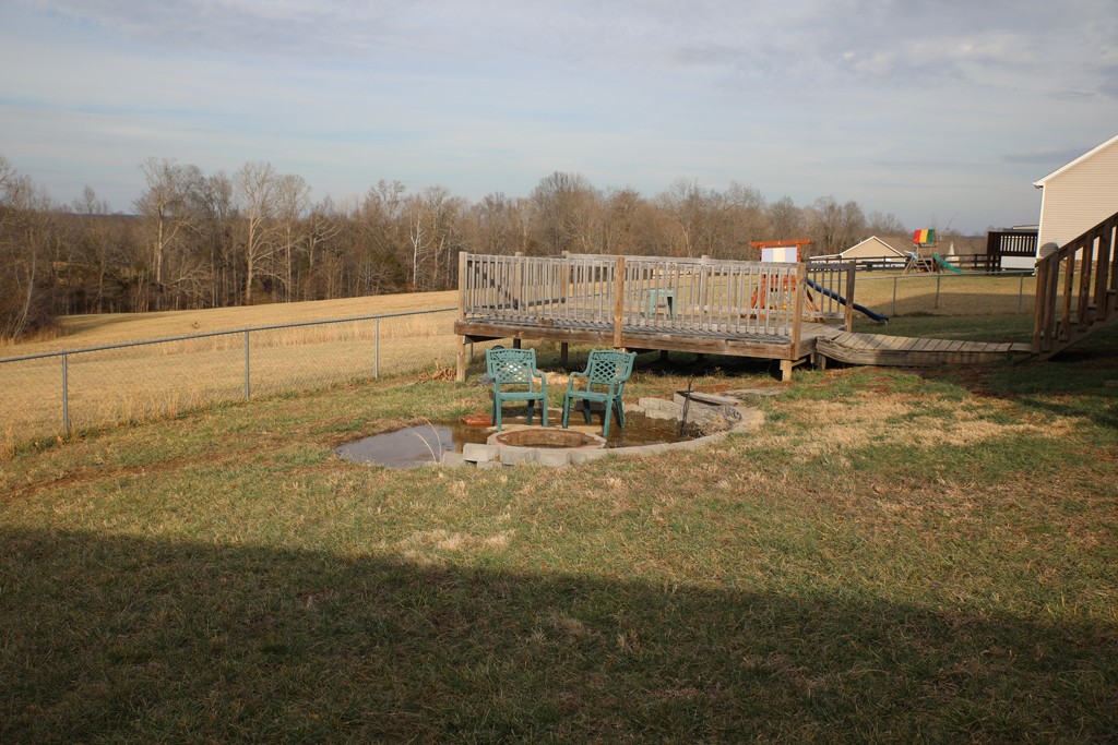 809 Hooper Road Charlotte, TN 37036 - Photo 12 of 14 a view of a lake with houses