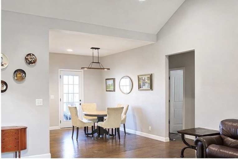 809 Hooper Road Charlotte, TN 37036 - Photo 2 of 14 a view of a dining room with furniture window and wooden floor