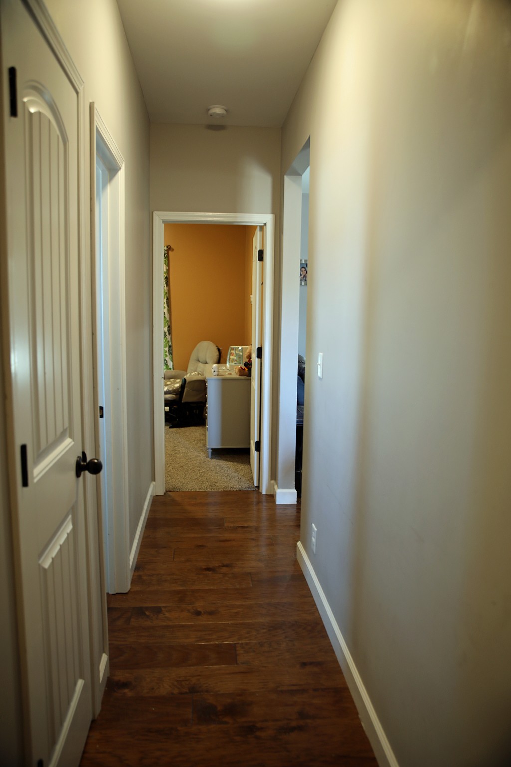 809 Hooper Road Charlotte, TN 37036 - Photo 6 of 14 a view of a hallway with wooden floor and closet