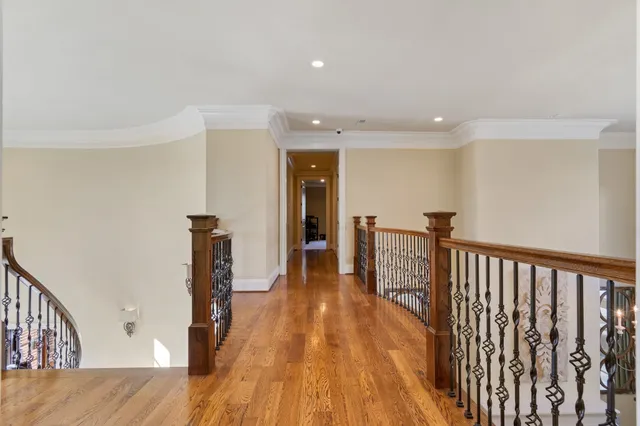 a front view of a residential apartment building with a yard