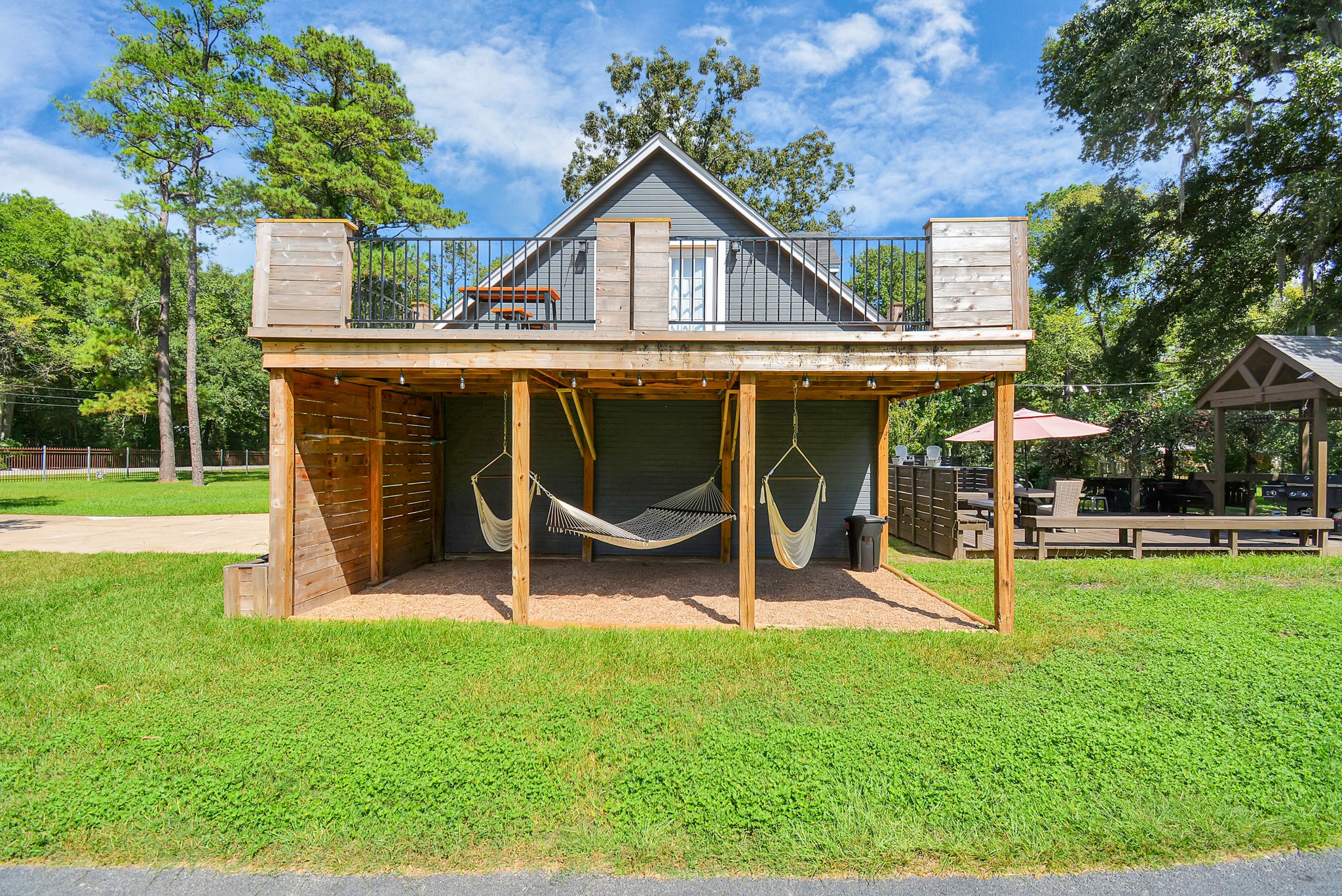 22936 Mossy Oaks Road Spring, TX 77389 - Photo 25 of 50 Plenty exterior hang out spaces throughout property