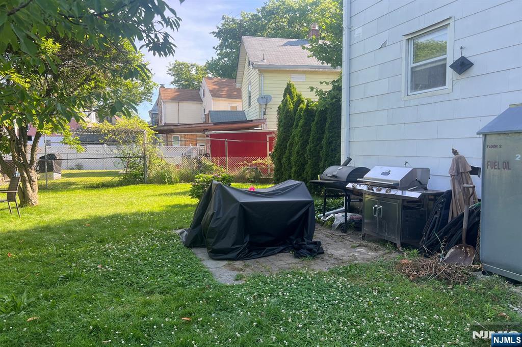 19 Spring Street, Unit 2 Bloomfield, NJ 07003 - Photo 19 of 19 a view of a backyard with sitting area and garden
