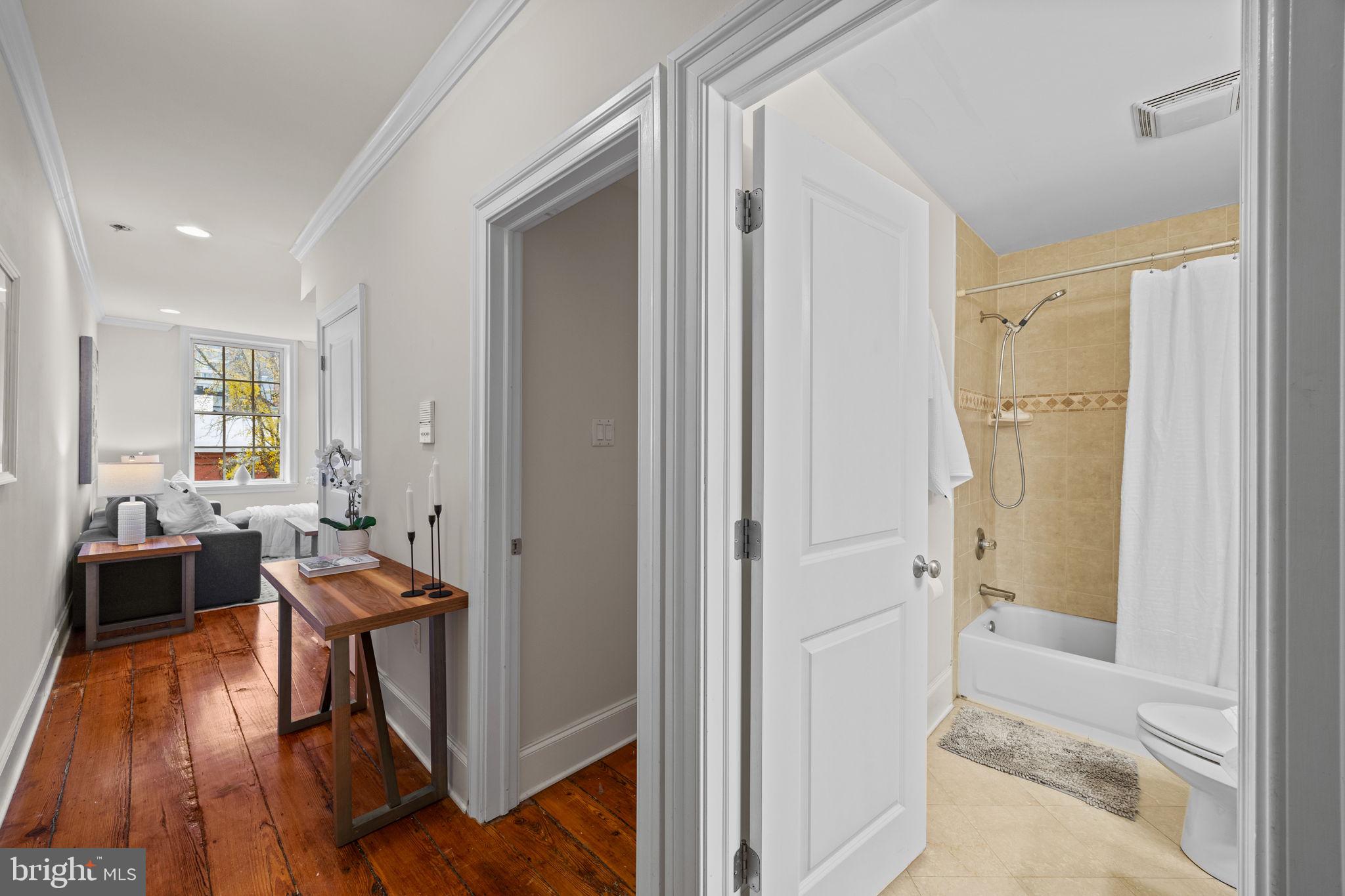1708 Pine Street, Unit 3F Philadelphia, PA 19103 - Photo 11 of 19 a view of a hallway with furniture and wooden floor