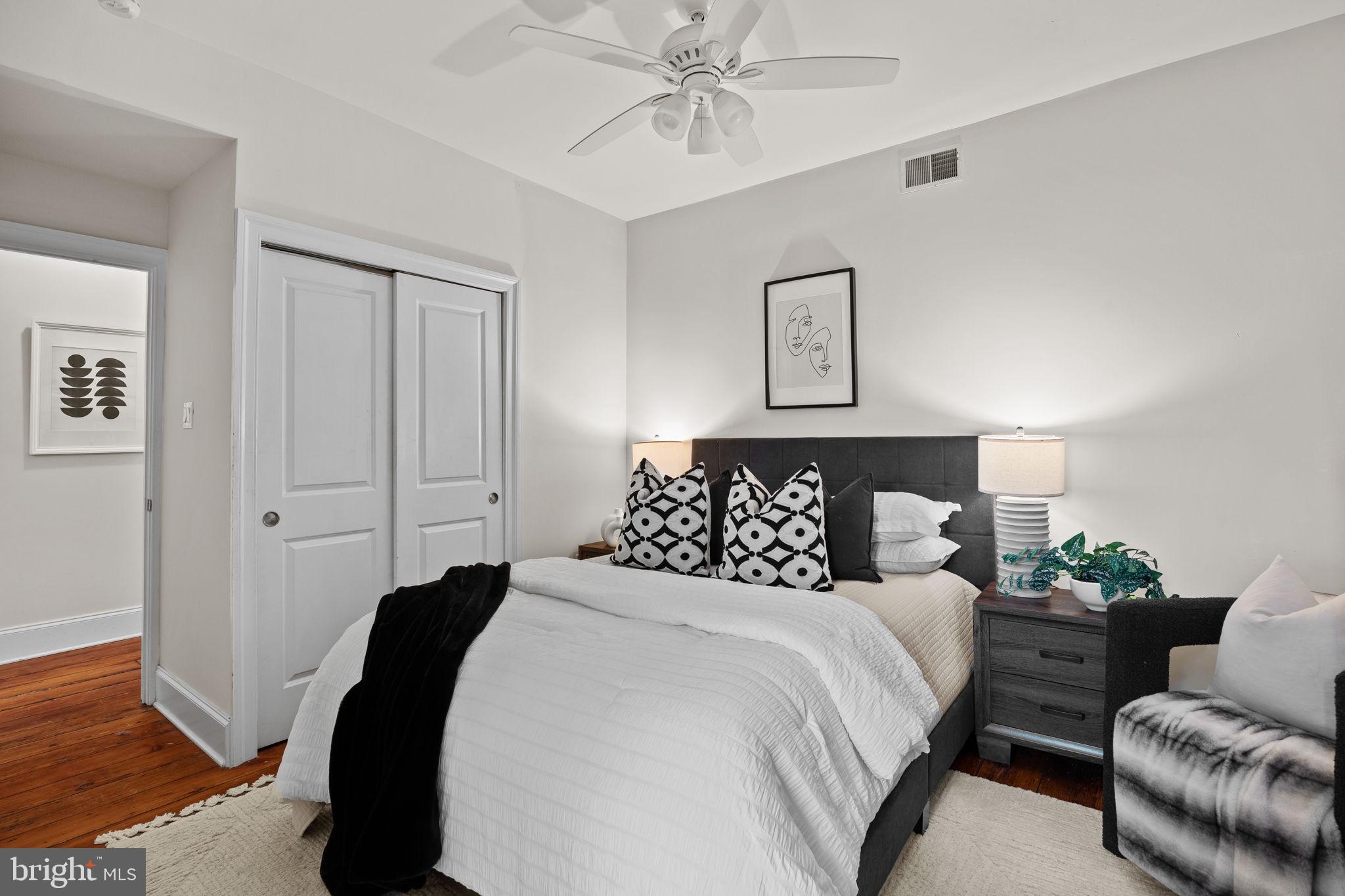 1708 Pine Street, Unit 3F Philadelphia, PA 19103 - Photo 14 of 19 a bedroom with a bed and window