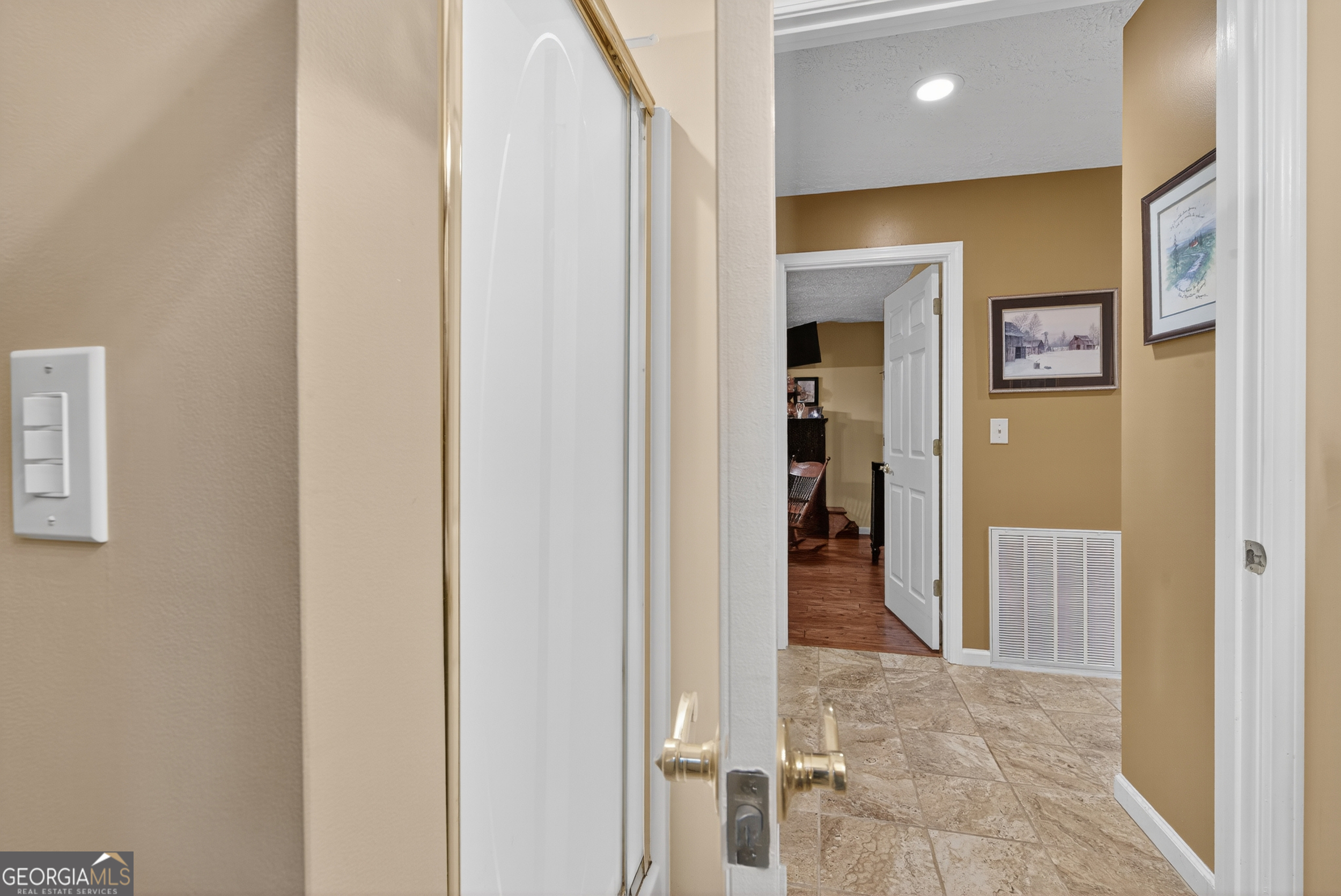 75 Juniper Trail Clayton, GA 30525 - Photo 16 of 38 a view of a hallway with wooden shelves