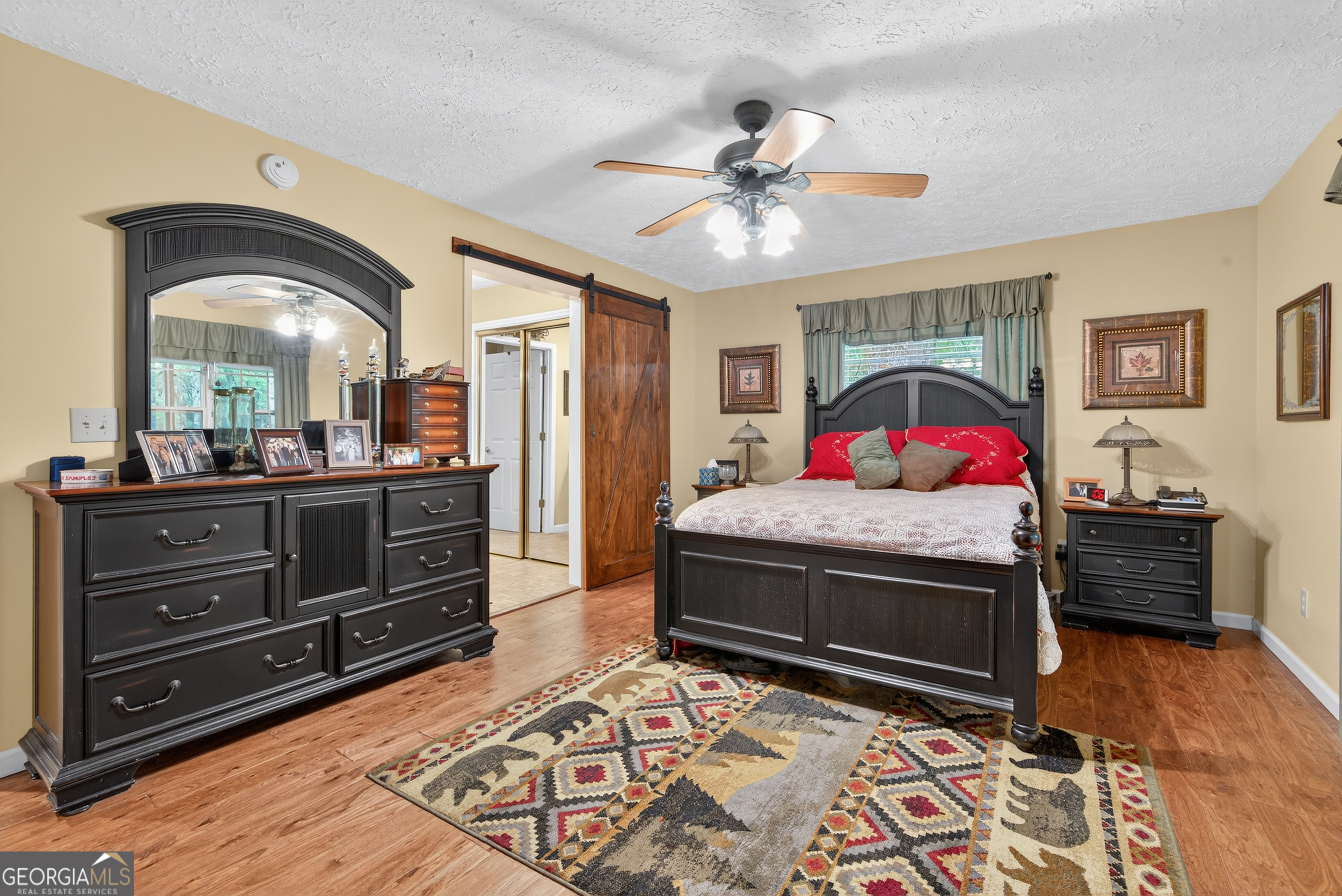 75 Juniper Trail Clayton, GA 30525 - Photo 18 of 38 a living room with furniture and a dresser
