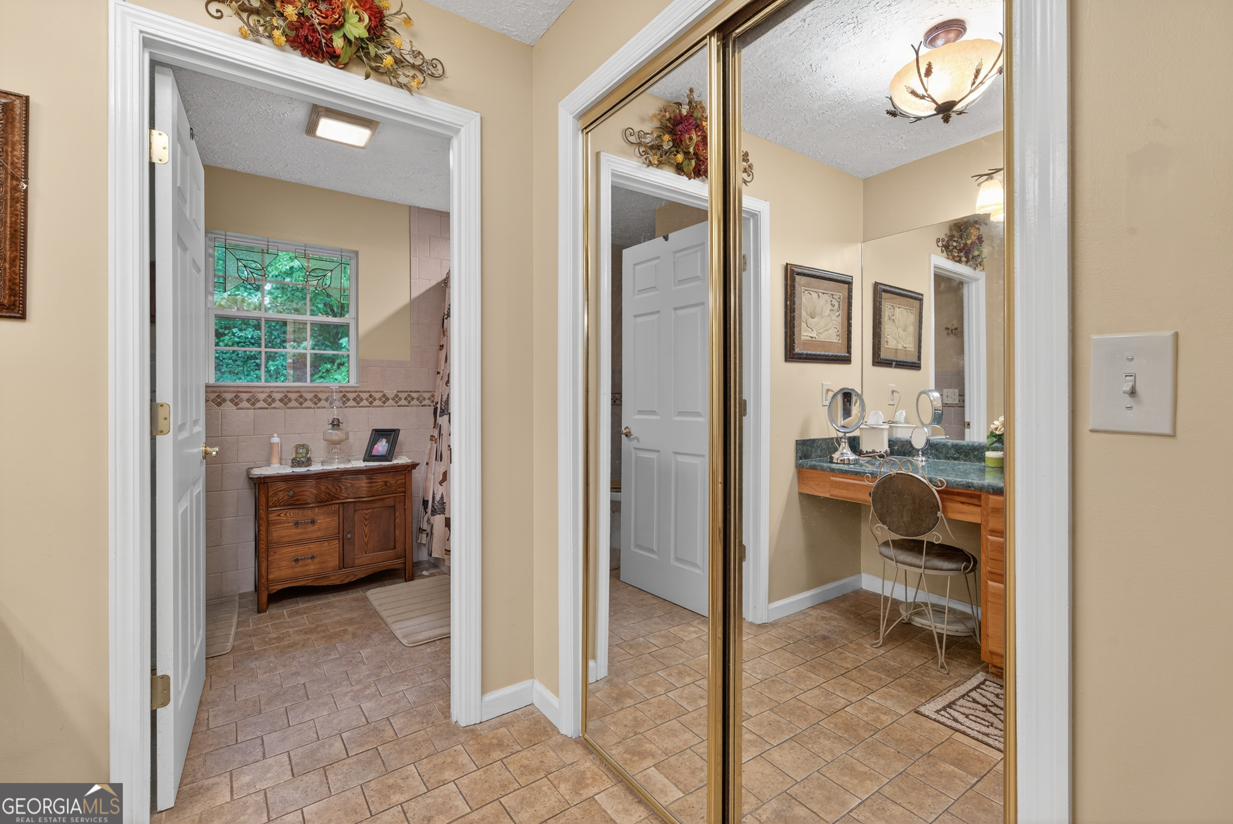 75 Juniper Trail Clayton, GA 30525 - Photo 21 of 38 a bathroom with a sink and a mirror