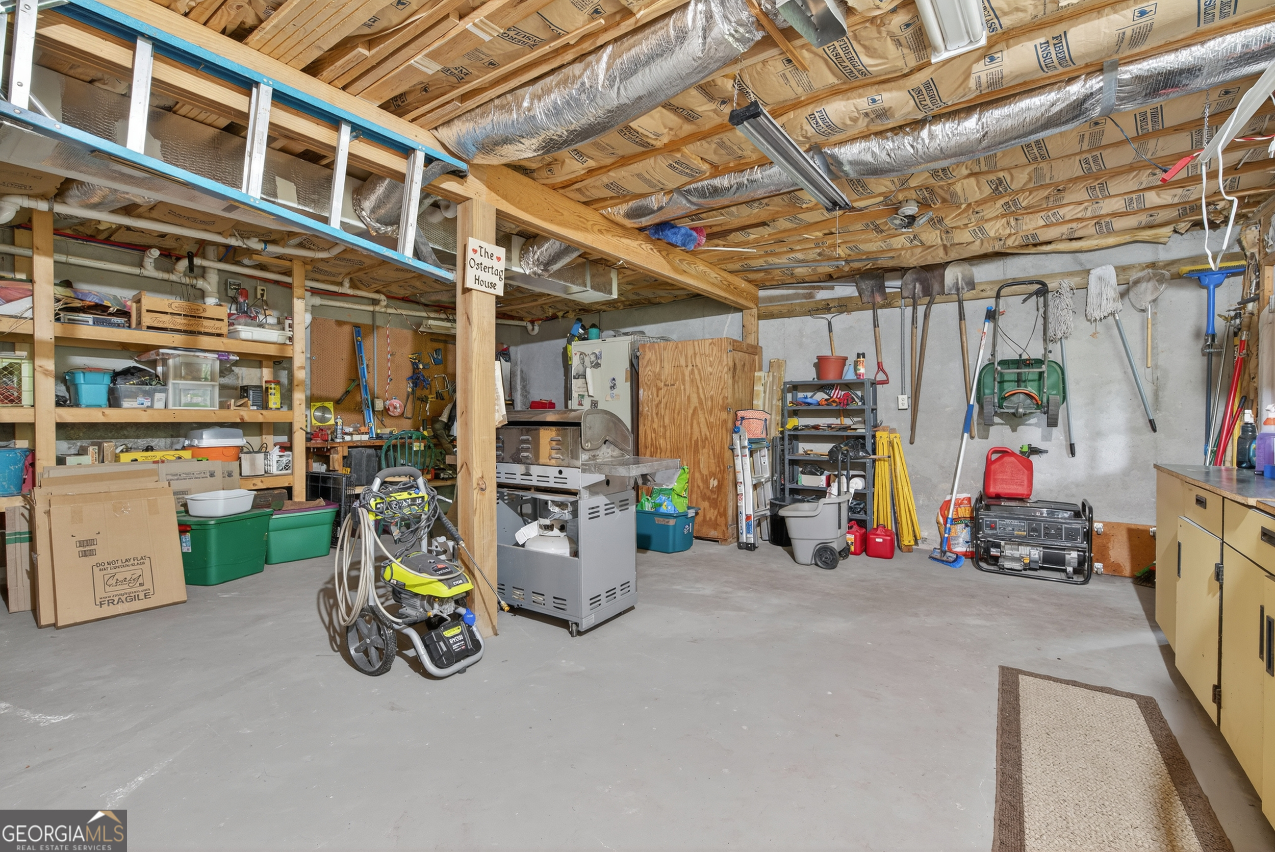 75 Juniper Trail Clayton, GA 30525 - Photo 29 of 38 a view of a storage room with gym equipment